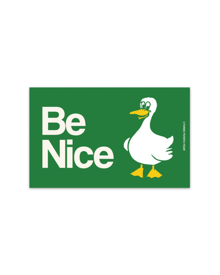 green rectangular bumper magnet with white 'be nice' text with goose design