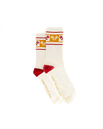 white crew socks with yellow and red floral print across the top and red heel