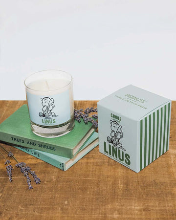 lavender scented candle with linus graphic and box