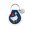 denim colored patch keychain with white embroidered goose, apple and white trim