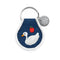 flipside of denim colored patch keychain with white embroidered sitting goose, apple and white trim