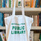 white tote with 'materials from public library' in kelly green