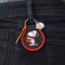 black and red patch keychain with dracula snoopy hanging from models pants