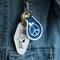 model wearing denim blue patch keychain with snoopy laying on a peace sign
