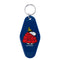 dark blue key tag with snoopy in a puffy red winter coat and yellow hat graphic
