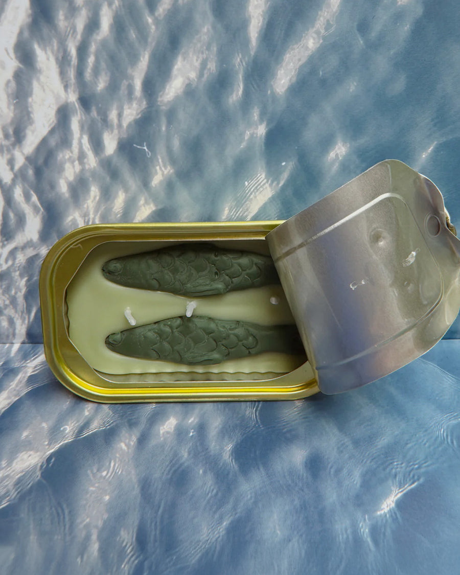 opened sealed green tea and lemongrass scented candle in a fish tin with fish candle inside