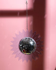 light blue sunburst suncatcher with disco ball center
