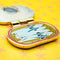 sideview of red, yellow and blue interactive 'catch of the day anchovies' canned anchovies pin