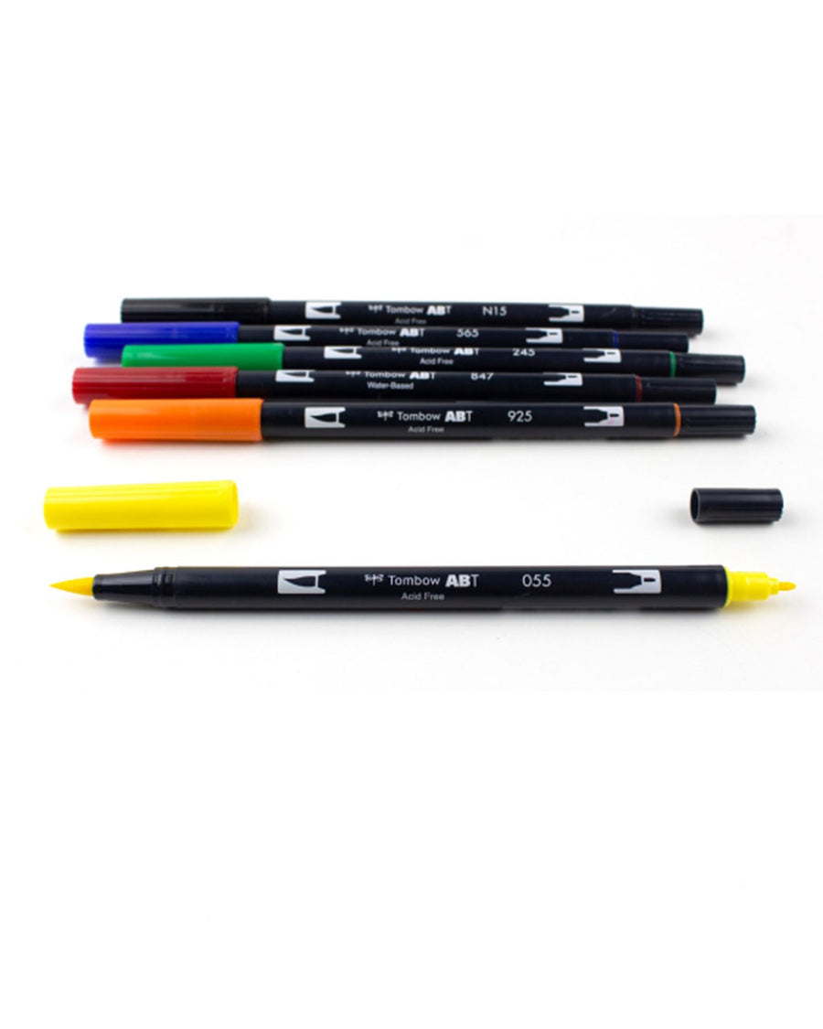 set of 6 dual brush pen set: yellow, orange, red, green, blue and black with caps off