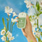 model holding lily of the valley 1 oz. gentle hand sanitizer