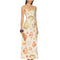 model wearing cream maxi dress with all over colorful seashell print