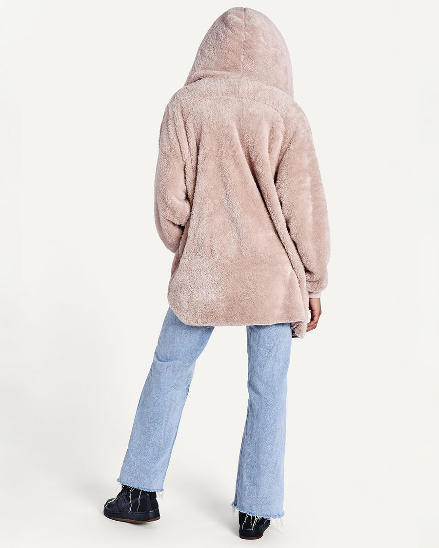 backview of model wearing dusty rose robe with big front pockets and hood