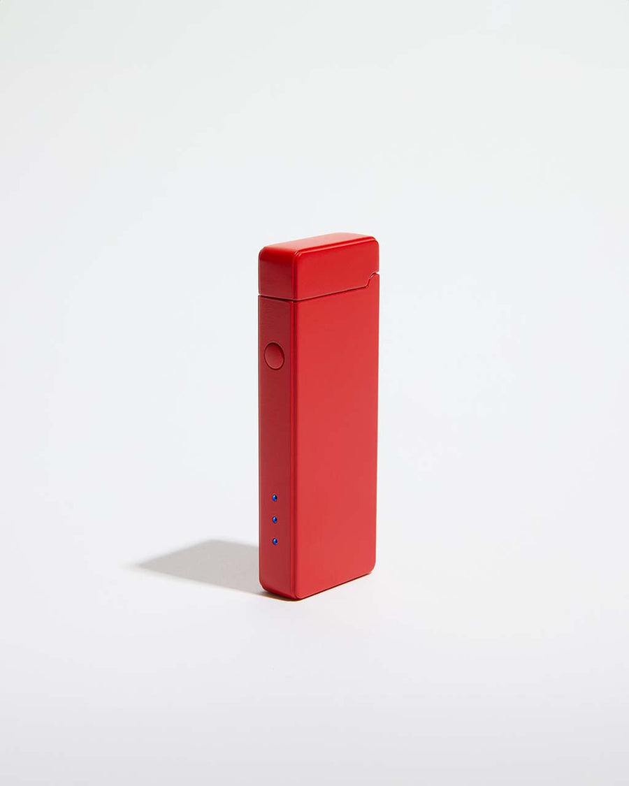 side view of closed red double arch slim lighter