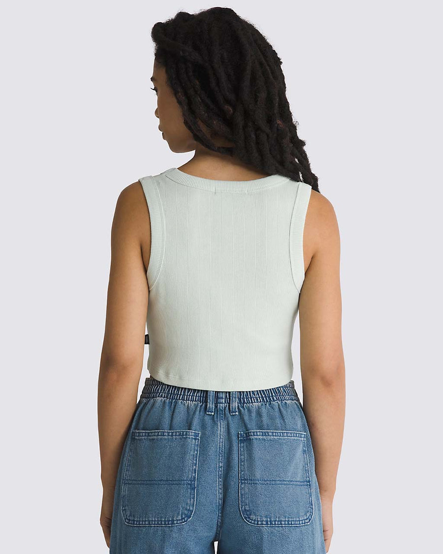 back view of model wearing cropped pale aqua tank with thick straps and ribbed material