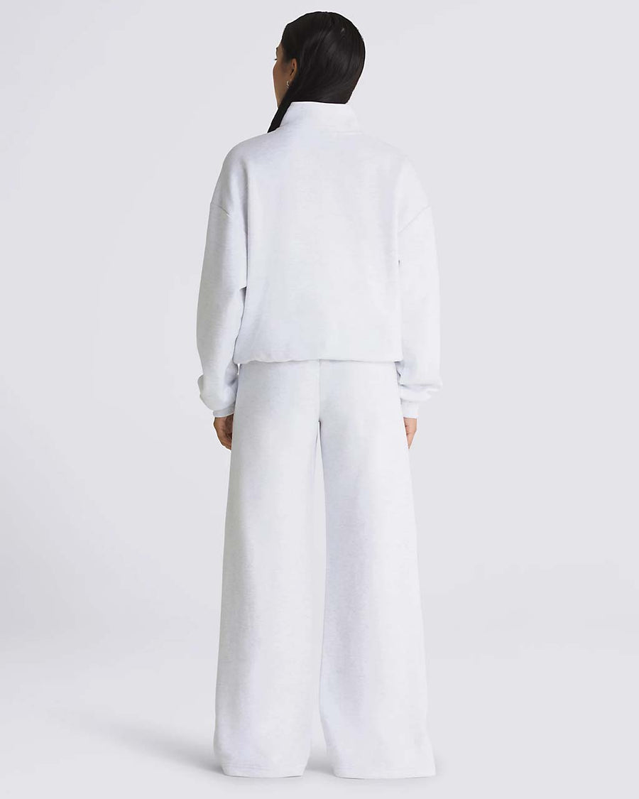 back view of model wearing white double knit mockneck sweatshirt with matching sweatpants