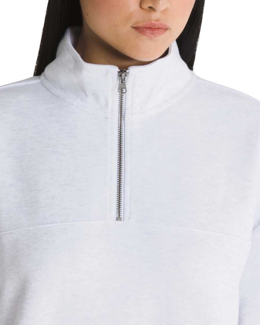 up close of model wearing white double knit mockneck sweatshirt with matching sweatpants