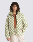 model wearing white and green checkered puffer jacket