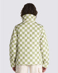 back view of model wearing white and green checkered puffer jacket