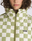 up close of model wearing white and green checkered puffer jacket