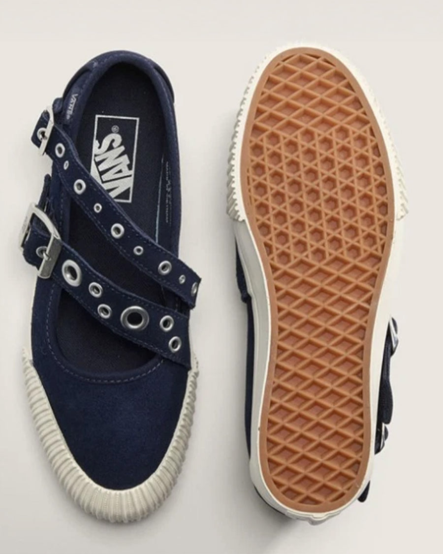 top and bottom view of navy strappy mary jane shoes with grommet details