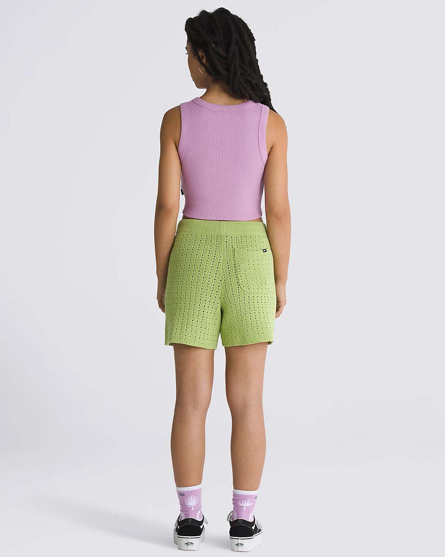 back view of model wearing green 5 in. knit shorts