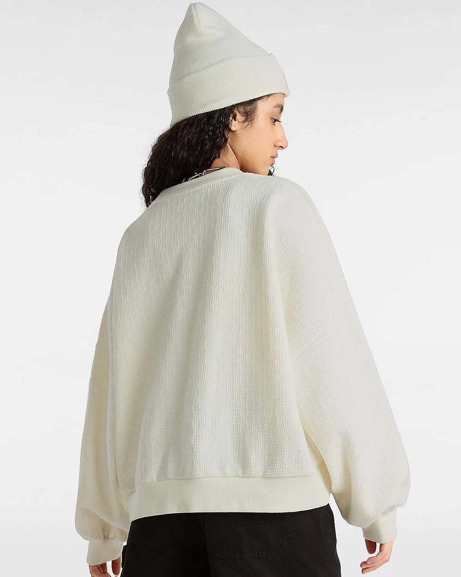 back view of model wearing marshmallow textured crew neck sweatshirt
