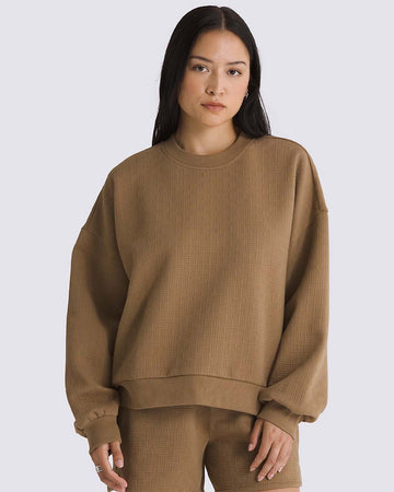 model wearing brown jacquard relaxed fit sweatshirt