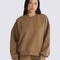 model wearing brown jacquard relaxed fit sweatshirt