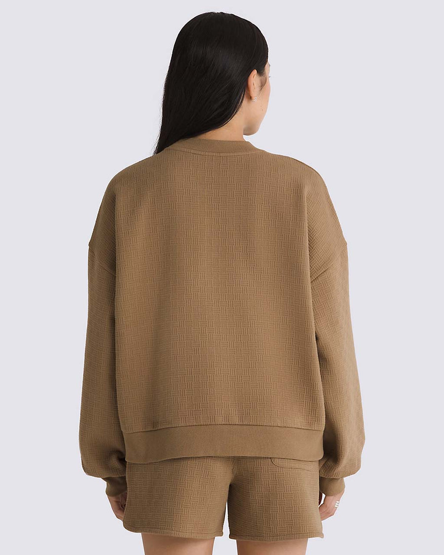 back view of model wearing brown jacquard relaxed fit sweatshirt