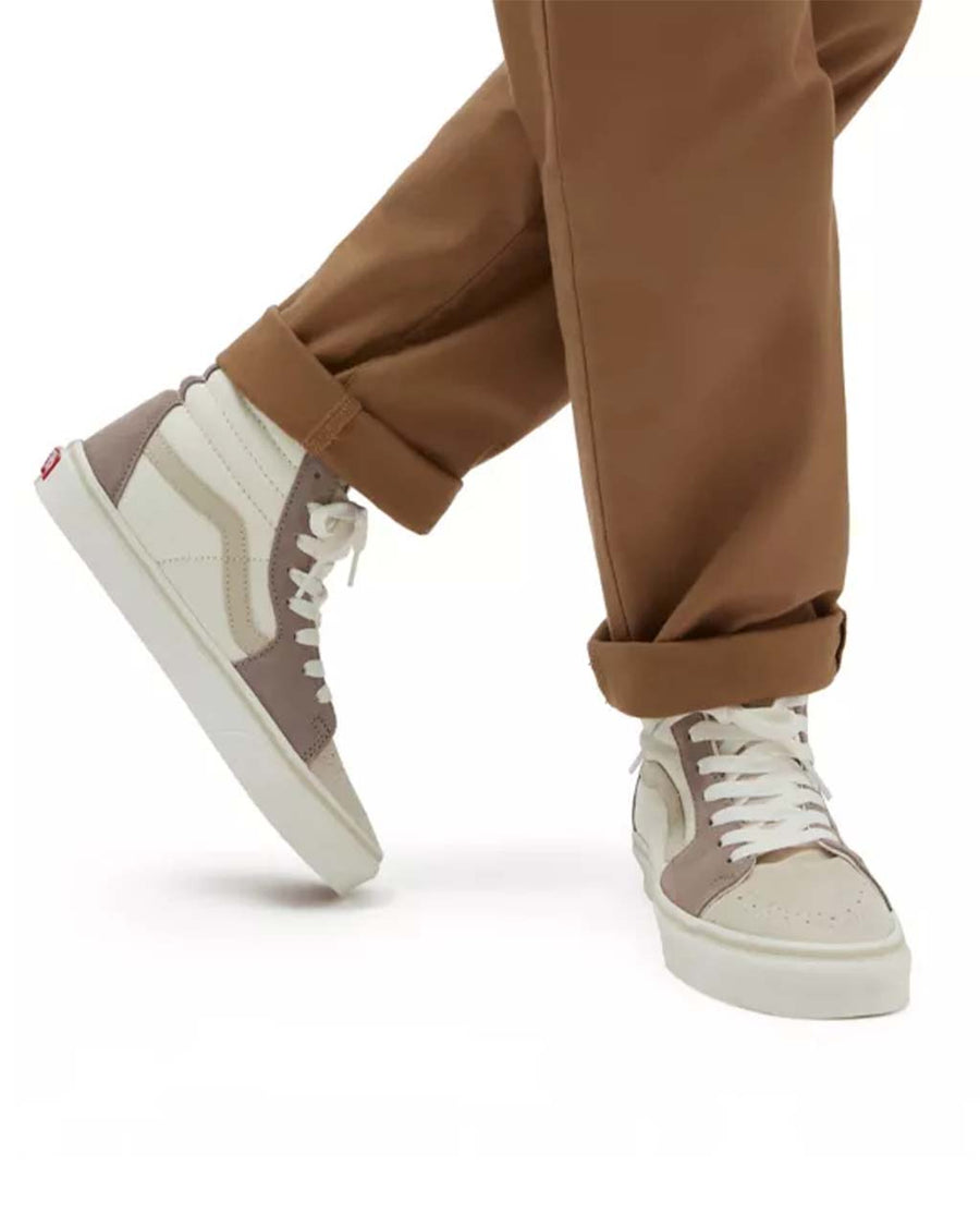 model wearing vans sk8-hi sneaker with cream and brown color blocking