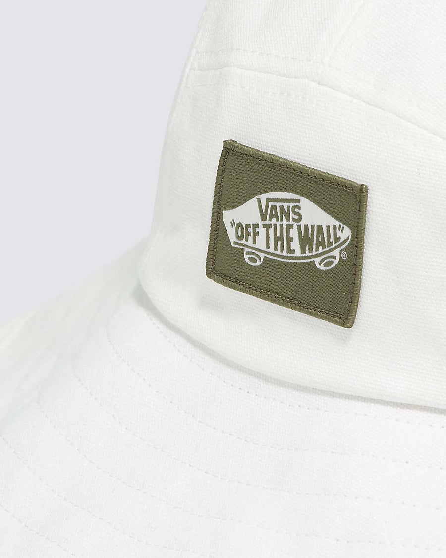 up close of white bucket hat with strap and green 'vans off the wall' patch
