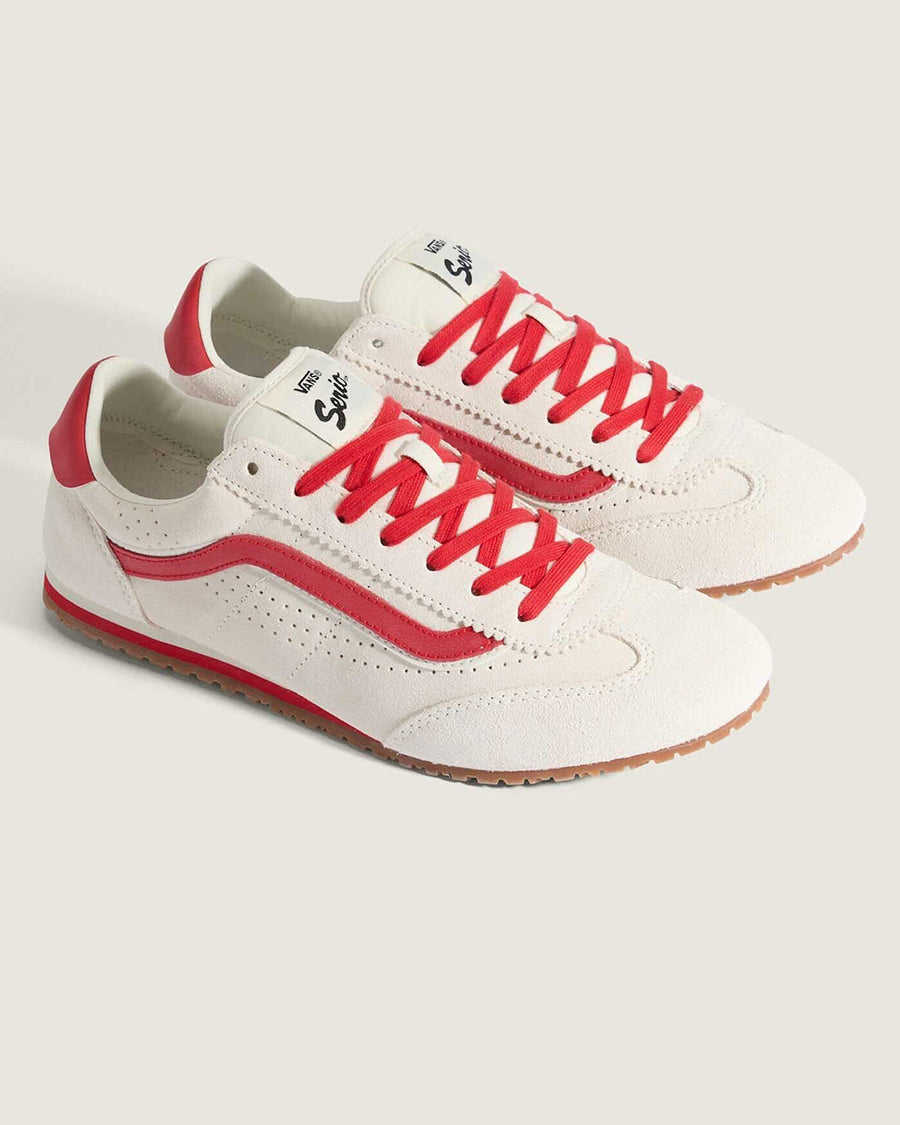 white super low pro with red trim, laces, and iconic stripe