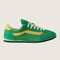 green super low pro sneakers with vibrant yellow stripe and trim