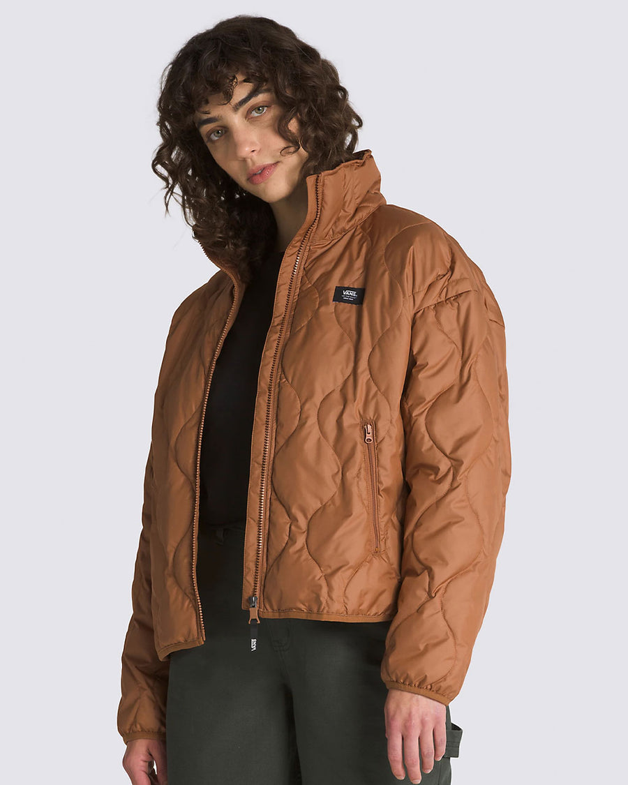 model wearing brown quilted cropped jacket