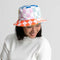 model wearing rainbow checkered patchwork bucket hat