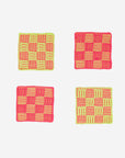 set of four checkered coasters: green and melon tones