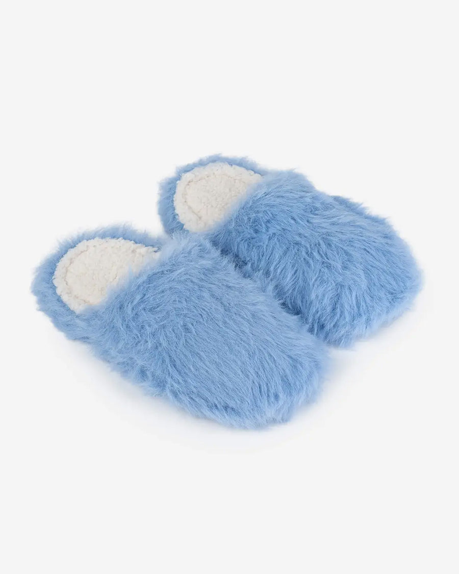 sideview of periwinkle fuzzy slide slippers