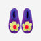 top view of blue and magenta marled slippers with yellow flower and red pom top