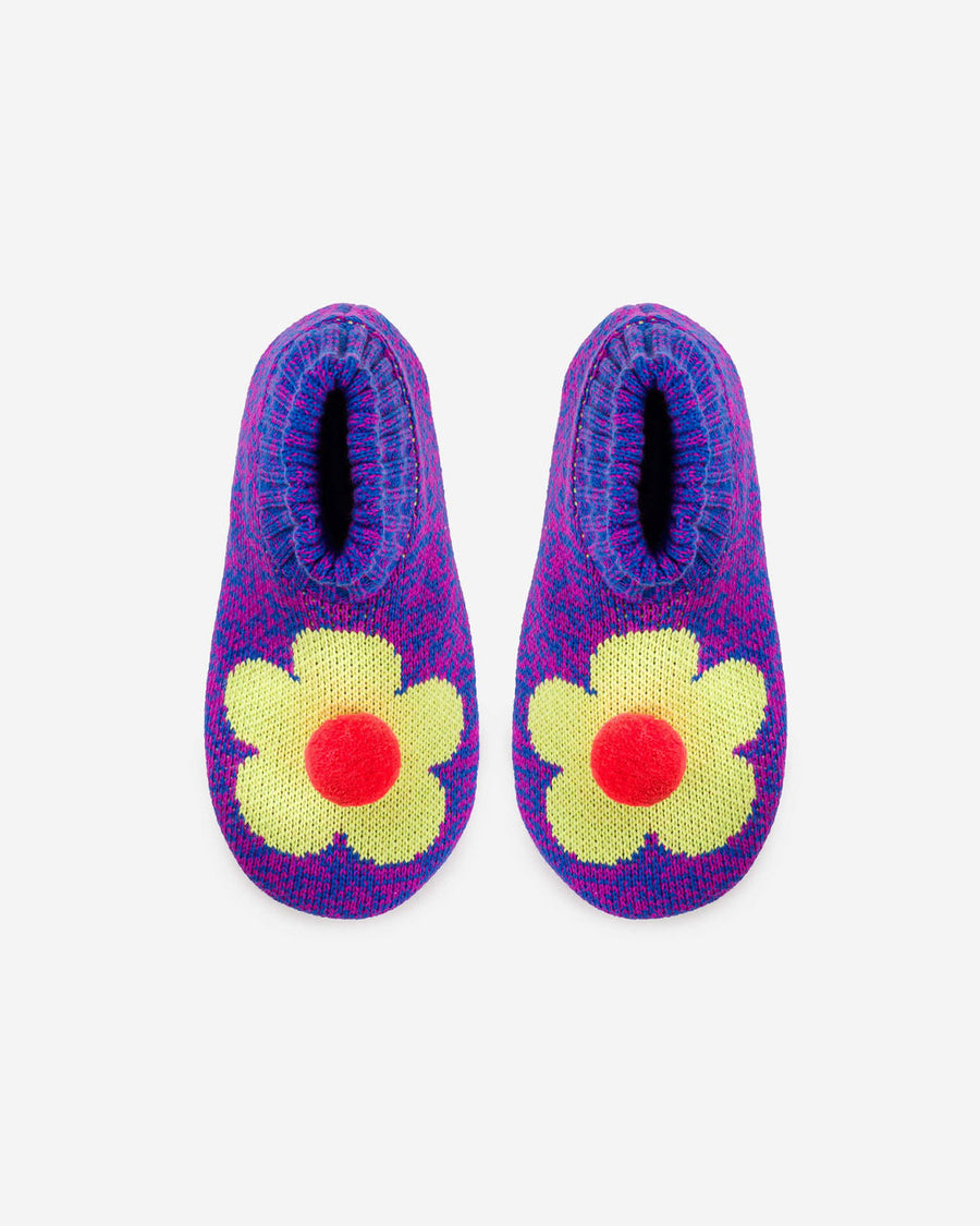 top view of blue and magenta marled slippers with yellow flower and red pom top