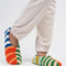 side view of multi-color stripe fleece slippers
