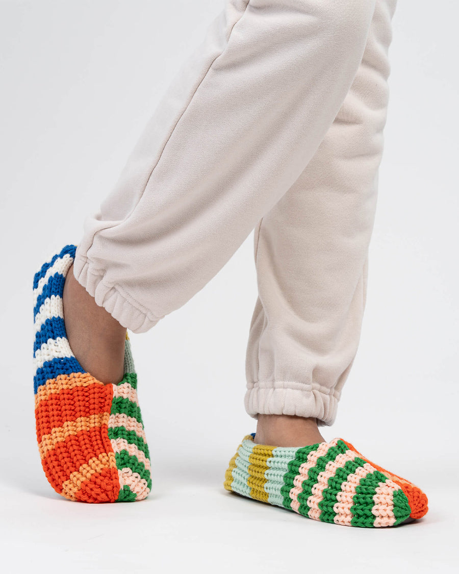 side view of multi-color stripe fleece slippers