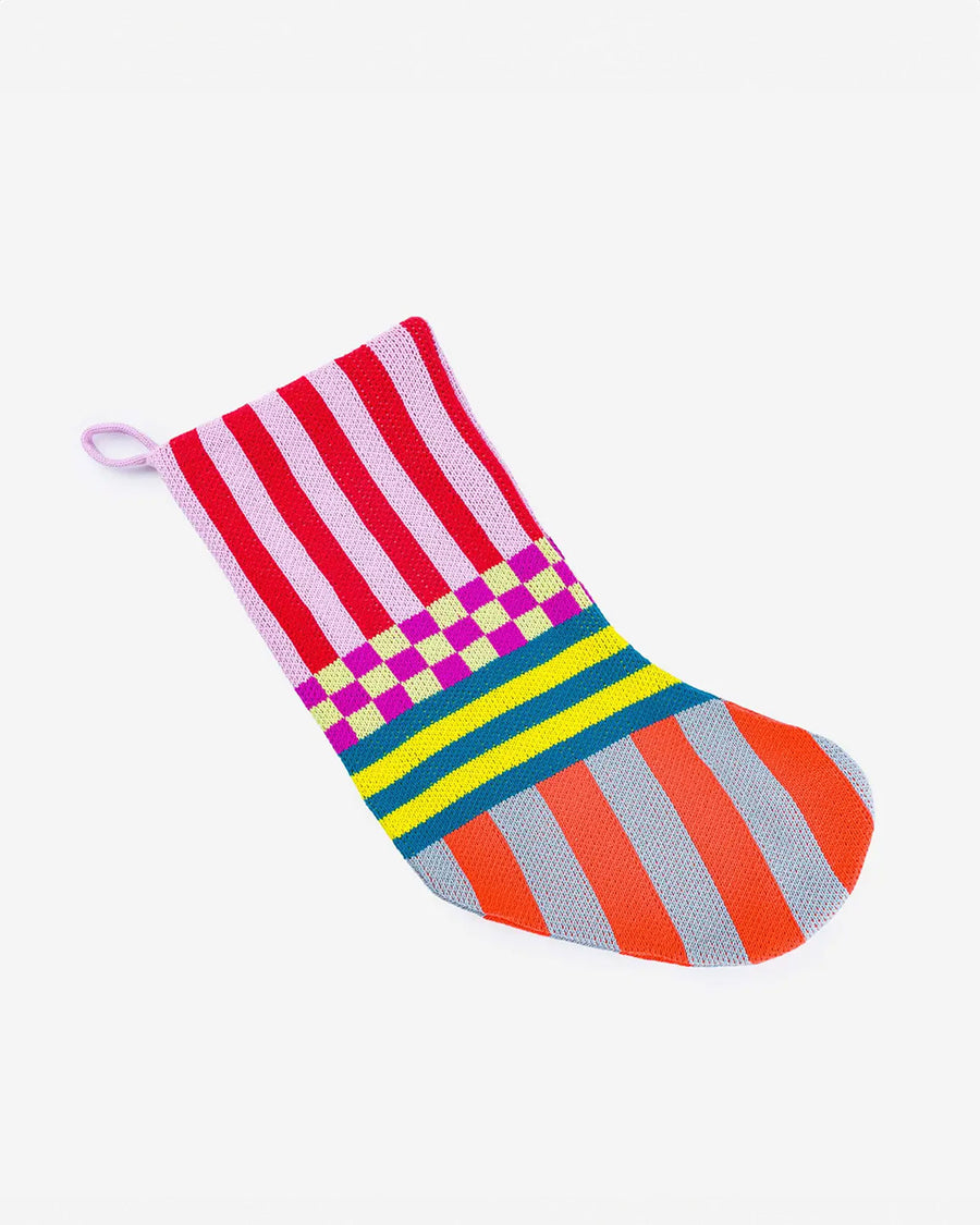 reverse side of multicolored holiday stocking with various stripes and checkered print