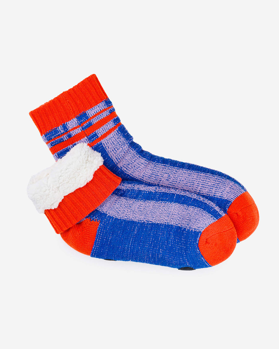 fleece interior of blue and lilac stripe socks with bright red trim