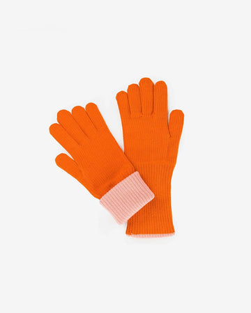 orange knit gloves with light pink interior