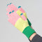 model wearing pink, yellow and green stripe tech gloves
