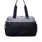back view of duffle bag with black and white leopard top and black bottom