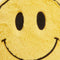 up close of face of yellow smiley face heating plush