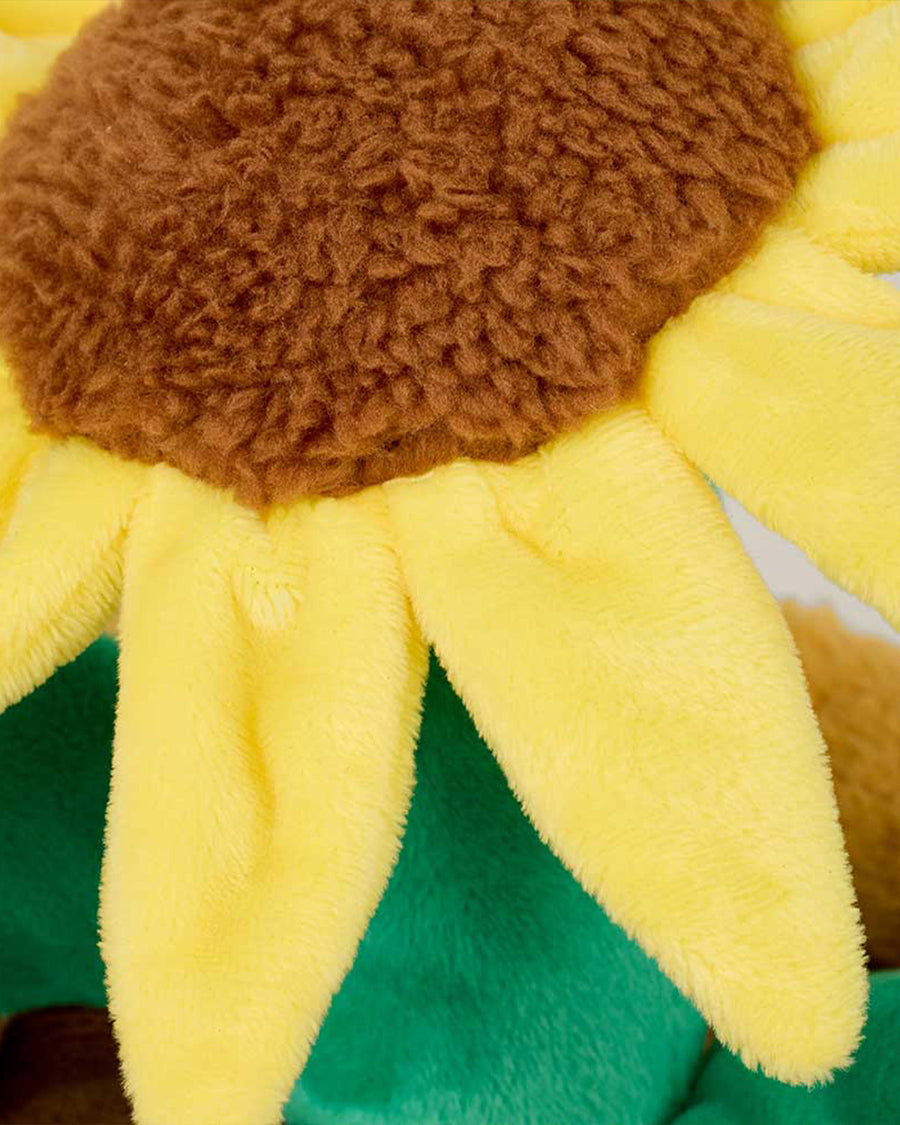 up close of flower on smiley potted sunflower warmies heating plush