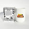 front and back view of coconut, suntan oil, and cannabis scented  candle and packaging