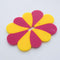 side view of  pink and yellow acrylic flower shaped toggle light switch